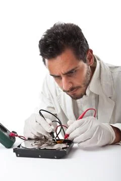 Technician and hard disk Stock Photos