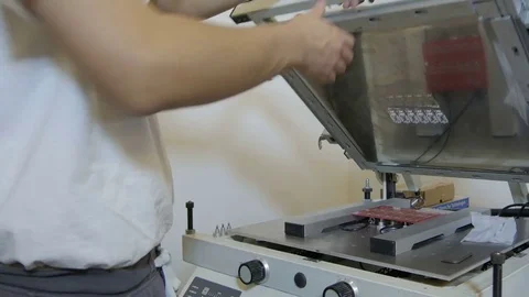 Technician applied tin on empty circuit board in production by Pakito. Stock Footage 71244274