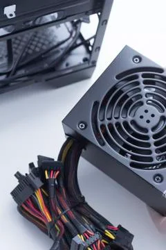 Technician assembling new computer power supply Stock Photos