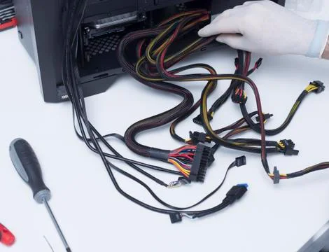 Technician assembling new computer power supply Stock Photos