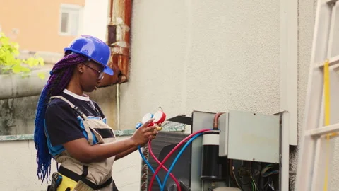 Technician calibrating benchmarking tool Stock Footage 246508037