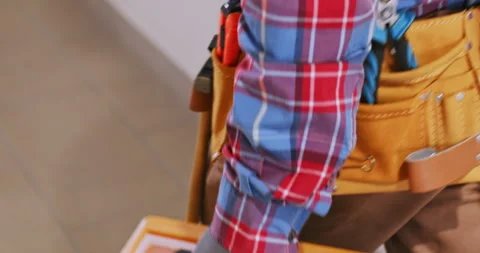 A technician carries a suitcase with tools Vídeos de archivo 247332852