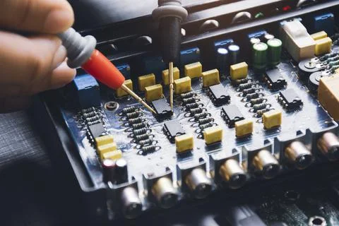 Technician checking ic on circuit board 스톡 사진