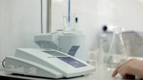 A technician is checking the quality of water Stock Footage 63014684