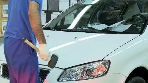 Technician checks car at assembly line inside Khodro car factory, Tehran, Iran Stock Footage 119181585