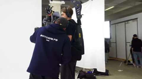 Technician circles operator checking every strap and bolt 動画素材 308951927