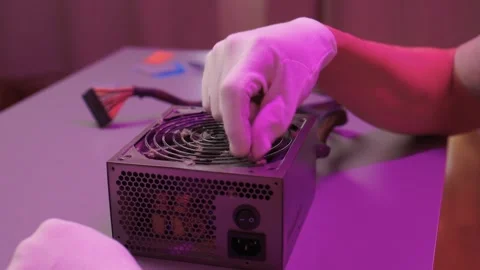 Technician cleaning computer. Expert cleaning and examining computer hardware Stock Footage 347877291