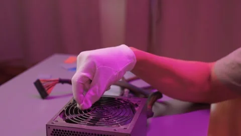 Technician cleaning computer. Expert cleaning and examining computer hardware Stock Footage 347877294