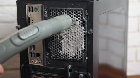 Technician cleaning dust from computer case ventilation grill Stock Footage 333395768