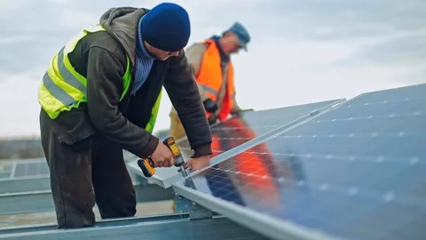 Technician connecting solar panel Video stock 126528796