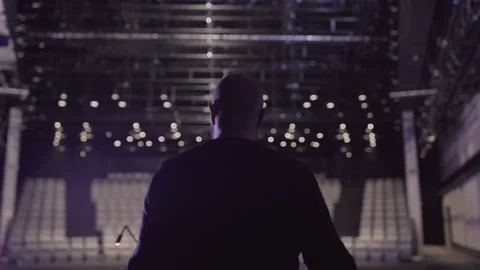 Technician Controls the Wave-Like Movement of the Theater Battens. Stock Footage 302761746