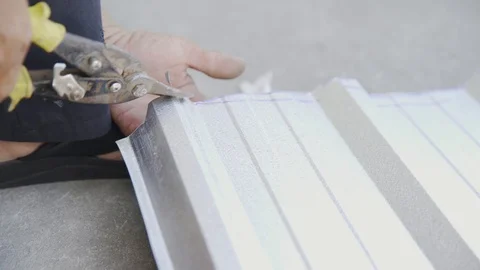 Technician cutting metal sheet Stock Footage 91644891