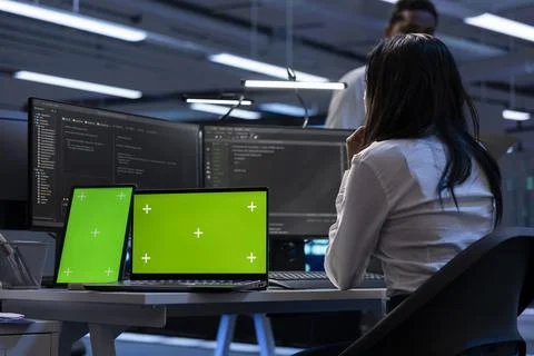 Technician in data center using isolated screen tablet and laptop 스톡 사진