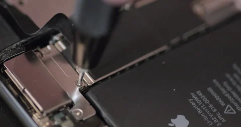 Technician disassembling iphone / Smart phone for repairment - 4K Stock Footage 295003191