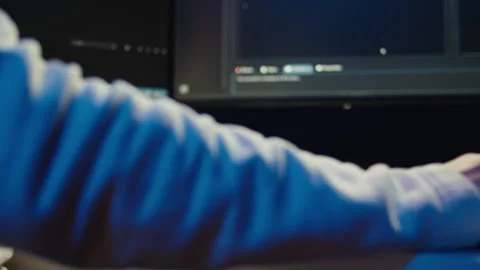 Technician doing software quality assurance, reading source code on PC Stock Footage 283689780