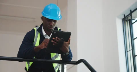Technician, engineering and black man with tablet for online schedule Stock Footage 341466348