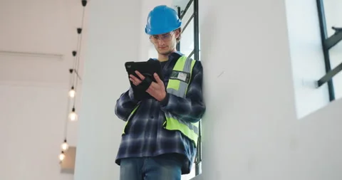 Technician, engineering and man with tablet for online schedule, renovation and Stock Footage 341466396
