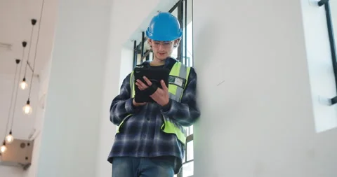 Technician, engineering and man with tablet for inspection, project renovation Stock Footage 341466437