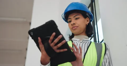 Technician, engineering and woman with tablet for schedule, renovation and Stock Footage 341466309