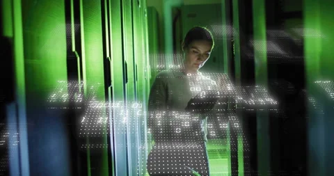 Technician entering data center kneeling at rack tapping tablet overlaying code Stock Footage 313770976