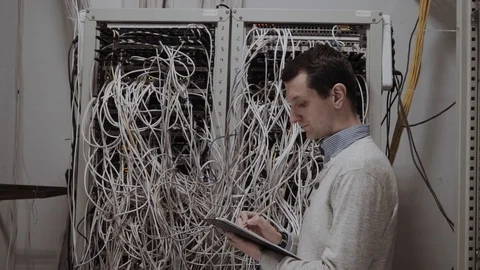 Technician examining server perfomance Video stock 86894686