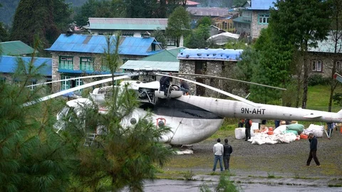Technician Fixing Broken Engine of Big Logistic Helicopter Stock Footage 94723496