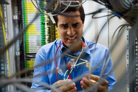 Technician fixing cable Foto stock