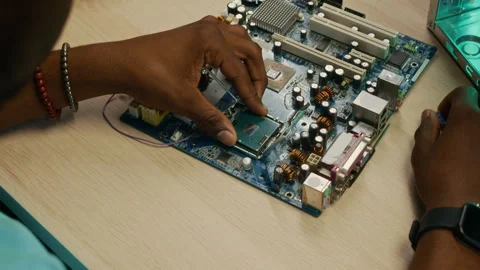 Technician Fixing Components of Computer Circuit at Desk Stock Footage 300080713