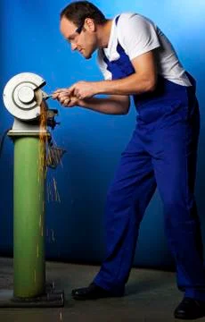 Technician on grinding bench Stock Photos