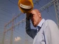 Technician Hard Worker Sweating Outside Doing His Job in a Summer Torrid Day 4k or 4k+ Resolution