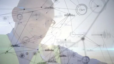 Technician holding device, studying screen and summoning AR network over wind Vídeo Stock 317741268