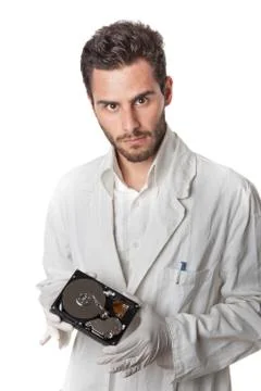Technician holding hard disk Stock Photos