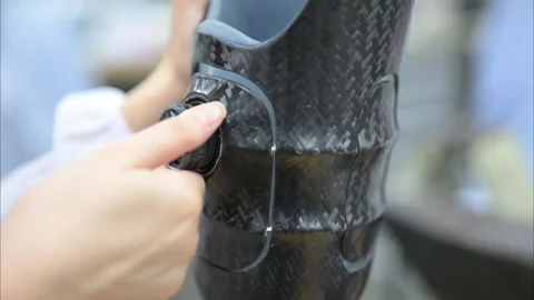Technician holding prosthetic leg checki... | Stock Video | Pond5
