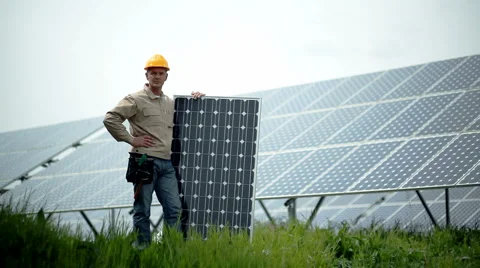 Technician holding a solar panel Stock Footage 3775200