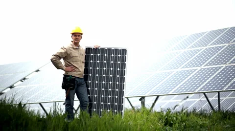 Technician holding a solar panel Stock Footage 3779342