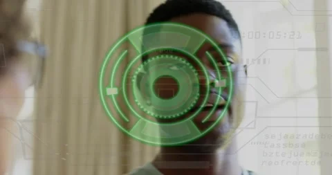 Technician initiating biometric scan while subject looking at holographic HUD 스톡 동영상 317734007