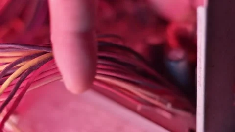 Technician Inspecting Bundled Multicolored Computer PSU Cables with Zip Tie.. 스톡 동영상 335145298