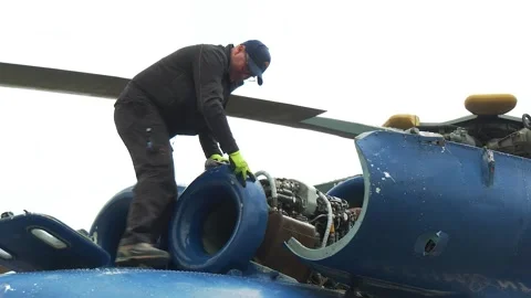 Technician Inspecting Mi-8 Helicopter Engine Stock-Footage 346302851