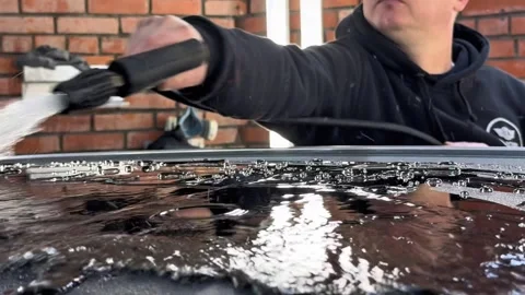 Technician Installing car window tint. Window toned film. Stock Footage 331116679