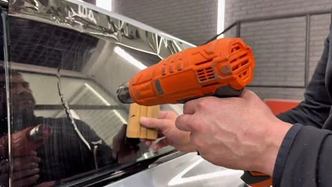 Technician Installing car window tint. Window toned film. Stock Footage 331116684