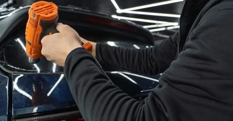 Technician Installing car window tint. Car window tinting series. Car windo.. Stock Photos