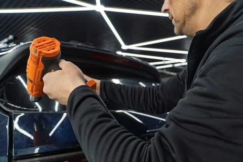 Technician Installing car window tint. Car window tinting series. Car windo.. Stock Photos