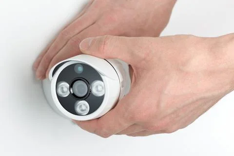 Technician installing CCTV camera video security Stock Photos