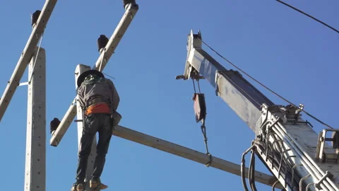 Technician installing equipment for high voltage electrical work on site Stock Footage 248157317