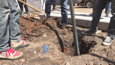 Technician installing equipment for high voltage electrical work on site Stock Footage 251551843