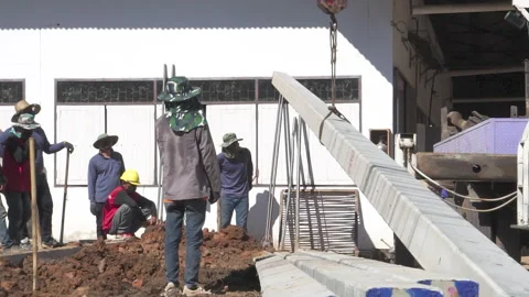 Technician installing equipment for high voltage electrical work on site Stock Footage 251552560