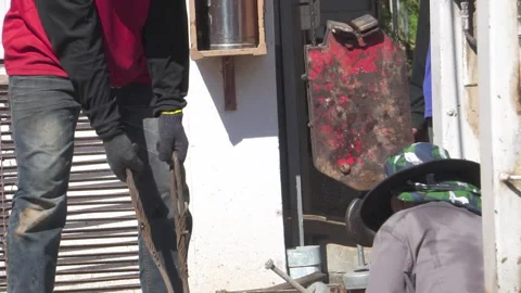 Technician installing equipment for high voltage electrical work on site Stock Footage 251552692