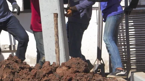 Technician installing equipment for high voltage electrical work on site Stock Footage 251552731