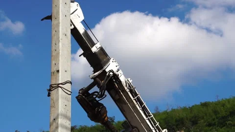 Technician installing equipment for high voltage electrical work on site Stock Footage 251552810
