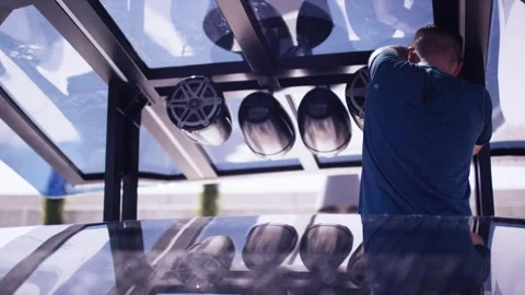 Technician Installing Marine Speaker System Under Boat Canopy, Side View Stock Footage 340334775